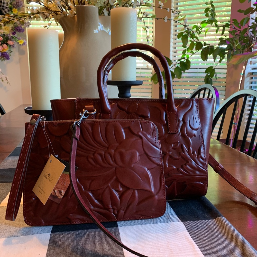 Patricia Nash Mozia tote w/ wristlet in iron red.